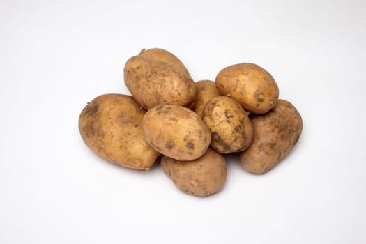 Bunch of potatoes on white