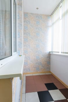 Anapa, Russia - March 3, 2020: Loggia glazed with plastic windows in the apartment