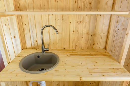 Kitchen working area made of natural wood close up