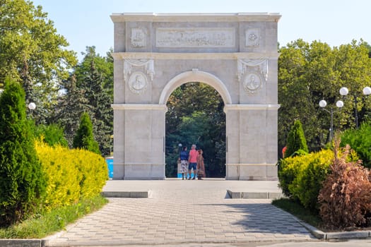 Anapa, Russia - 17 September 2020: Triumphal arch and a small alley in honor of the victory in the Russian-Turkish war on the theater square in Anapa
