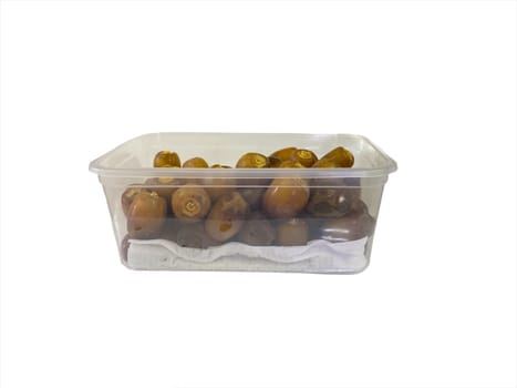 Fresh raw dates fruits isolated on white background. Selective focus