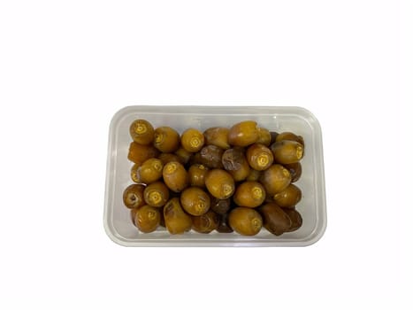 Fresh raw dates fruits isolated on white background. Selective focus