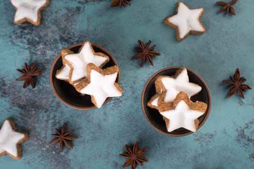 Cinnamon stars, traditional german christmas cookies, gingerbread, empty copy space