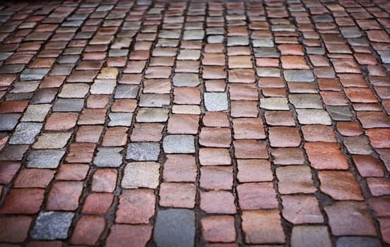 old pavement background in old Tallinn on rainy day