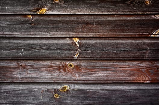 Old wooden planks on gates of an abandoned building