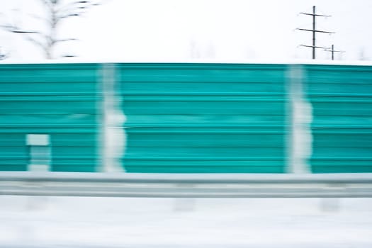 View from car side window with blurred motion
