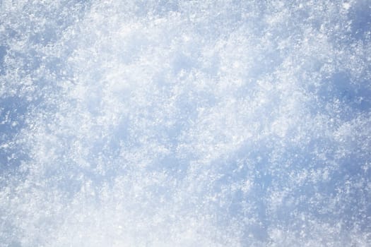 Snowflakes background on beautiful sunny day