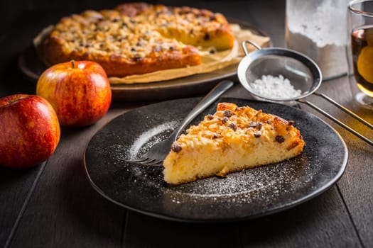 Delicious apple pie with chocolate pieces and ingredients for Thanksgiving