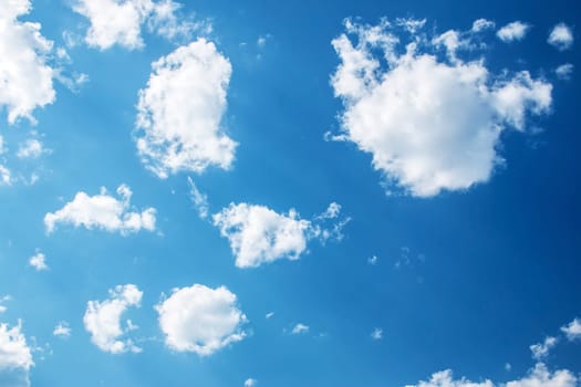 white clouds on the blue sky on sunny day