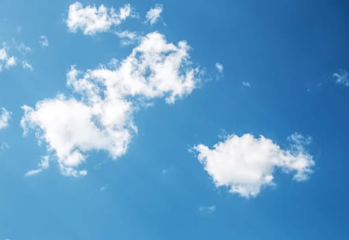 white clouds on the blue sky on sunny day