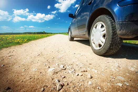 Car tires on gravel goad