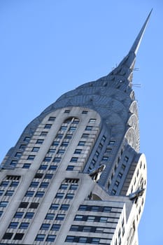The historic Chrysler Building is located in the Midtown district of Manhattan and is one of the landmarks of NYC - New York City. It was listed as a National Historic Landmark in 1976.