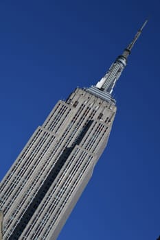 New York's landmark,the Empire State Building,attracts many millions of visitors every year. It is located in the district of Midtown Manhattan - NYC.