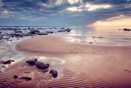 view to baltic seacoast at sunset ligt
