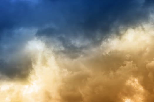 Dramatic clouds on the blue sky on sunny day