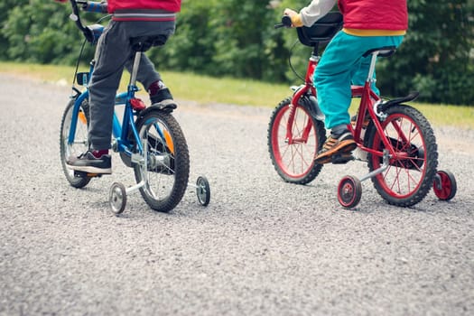 child on a bicycle at asphalt road