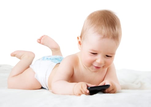 Baby holding a mobile phone isolated on white background