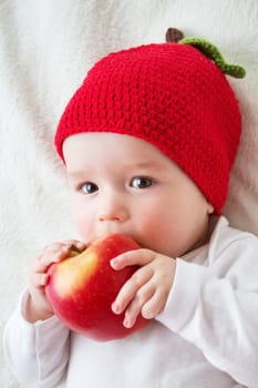 7 month old baby in apple hat