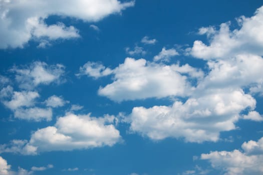 white clouds on the blue sky on sunny day