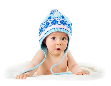 little baby isolated on white background lying on soft blanket