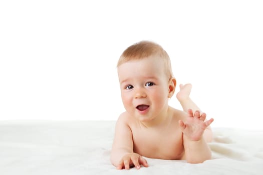 little baby isolated on white background lying on soft blanket