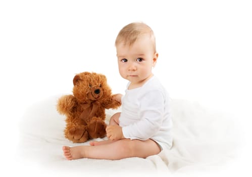 Little baby isolated on white background with teddy bear