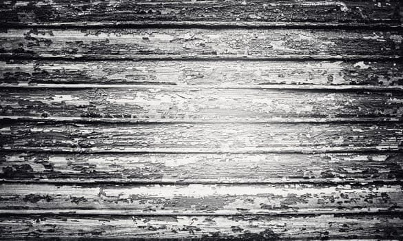 Old weathered wooden wall with old paint