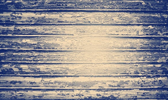 Old weathered wooden wall with old paint