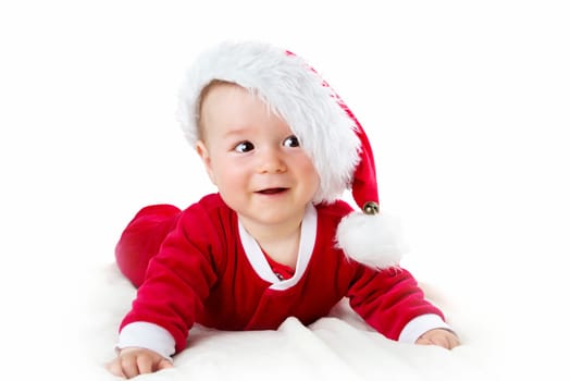 eight month old baby isolated on white background in santa costume