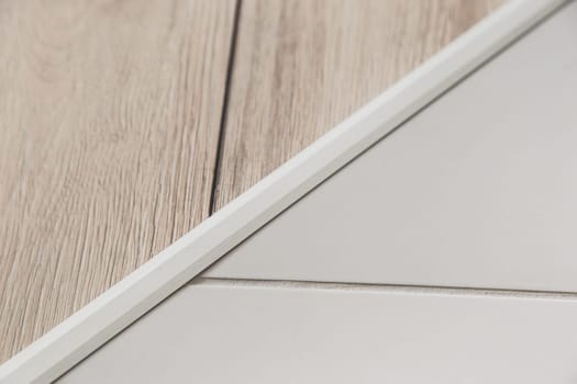 Aluminium platband for laminate and tile floor joints, floor connector, decorative strip or sill