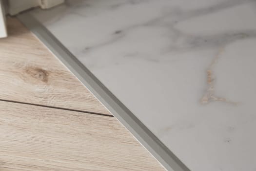 Aluminium platband for laminate and tile floor joints, floor connector, decorative strip or sill