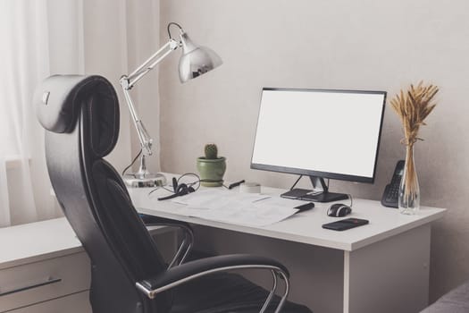 Modern stylish home office workplace. White, black and chrome colors