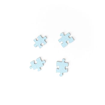 Unsuitable four puzzle pieces on white background. Top view. Unsolved problem concept