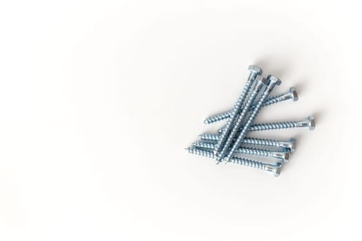 Metal ison screws isolated on white background. Top view
