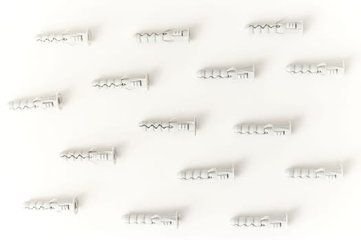 Plastic dowels isolated on white background. Flat lay, Seamless, endless backdrop.