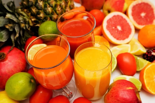 Fruit and vegetable juices on a white background