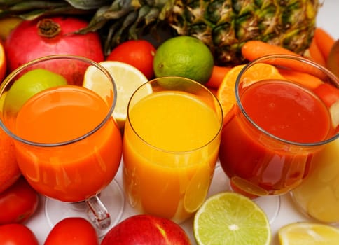 Fruit and vegetable juices on a white background