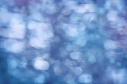 Blurred blue christmas background with beautiful bokeh