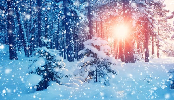Beautiful tree in winter landscape in late evening in snowfall