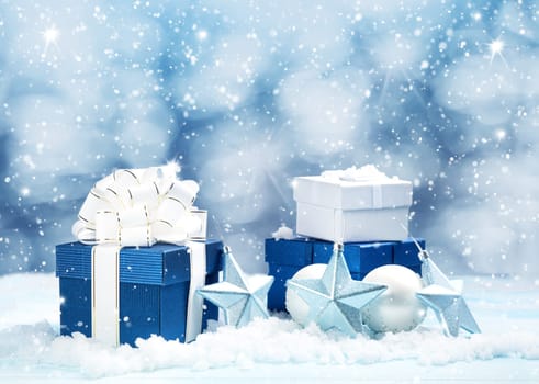 Blue gift boxes with christmas decoration on beautiful background