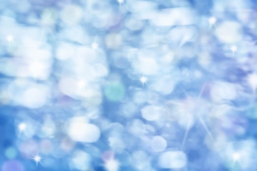 Blurred blue christmas background with beautiful bokeh