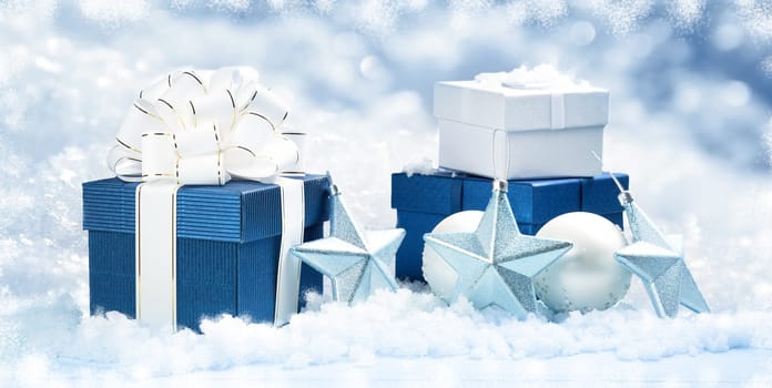 Blue gift boxes with christmas decoration on beautiful background