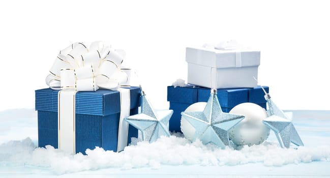 Blue gift boxes with christmas decoration on white background