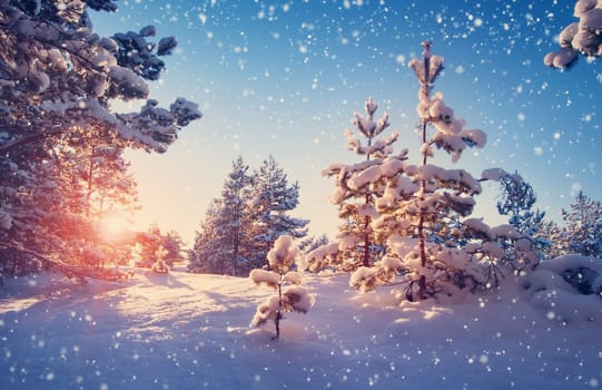 Beautiful tree in winter landscape in late evening in snowfall