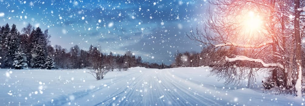 winter panorama on the road through snowy alley