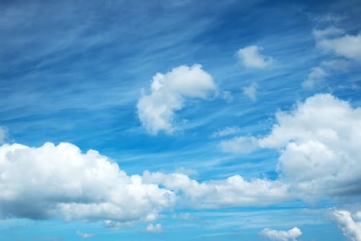 white clouds on the blue sky on sunny day