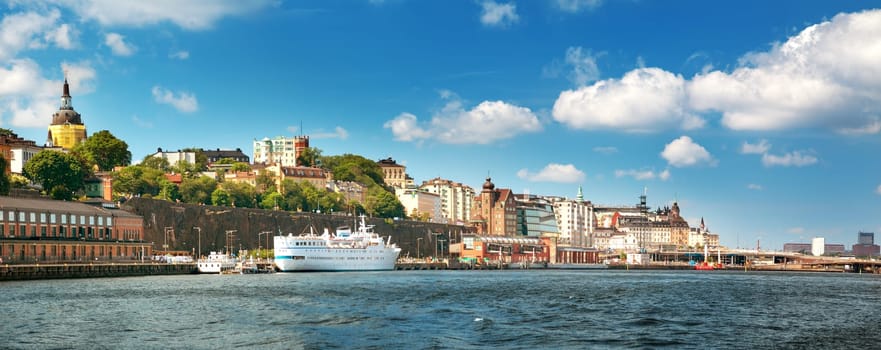 View to Stockholm, Sweden with a ferry from sea in summer. Gamla Stan on sunny day