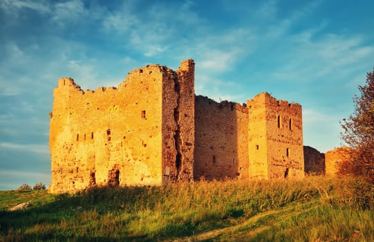 Old castle ruins in sunset light. Toolse in northern Estonia
