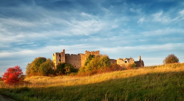 Old castle ruins in sunset light. Toolse in northern Estonia