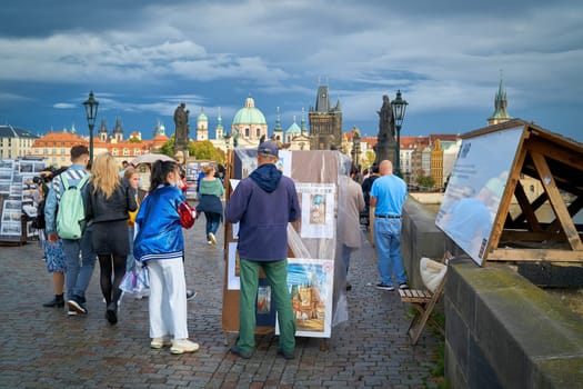 Tourists from many countries on the Charles Bridge in Prague